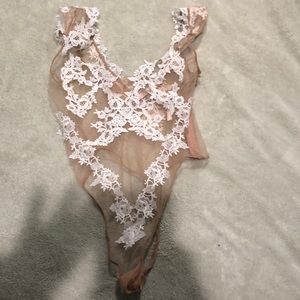 Victoria’s Secret nude and white sheer body suit